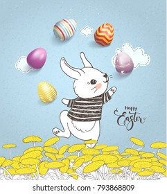 Funny hand drawn baby rabbit wearing striped t-shirt juggling with decorated eggs on floral meadow and Happy Easter handwritten inscription against blue background with clouds. Vector illustration.