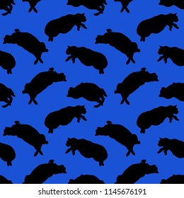 Funny hand drawn fat cats lying seamless pattern. Animal vector outline sketch background illustration with kitties. Cute pet backdrop in black over blue.