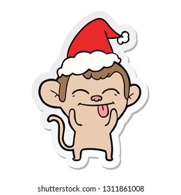 funny hand drawn sticker cartoon of a monkey wearing santa hat