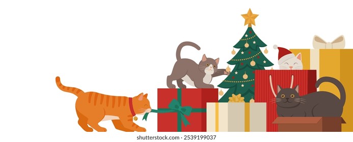 Funny happy cats playing with Christmas gifts and decorations, holidays and pets concept