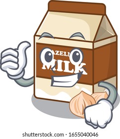 Leche de avellanas divertida que hace gesto de Thumbs