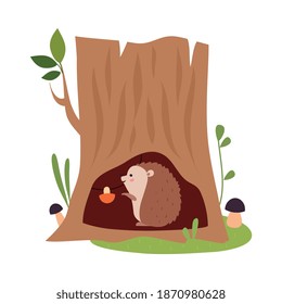 Funny Hedgehog as Forest Animal Reserving Mushrooms in Tree Hollow Vector Illustration