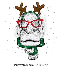 Funny Hippo in glasses and with horns. Hippopotamus in a deer costume. Vector illustration for a card or poster, print on clothes. New Year's and Christmas.