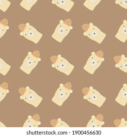 Funny kids seamless pattern with doodle hand drawn bear in hats design. Light brown background. Vector illustration for seasonal textile prints, fabric, banners, backdrops and wallpapers.