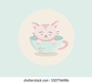 
Funny kitten sits in a cup