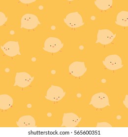 Funny little chickens on yellow and orange dotted background. Cute vector seamless pattern for children's textile, easter cards, wrapping, poligraphy, web and fabric design.