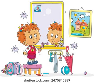 Funny little girl combing her hair in front of a mirror in a hallway with a picture on a wall, vector cartoon illustration isolated on white