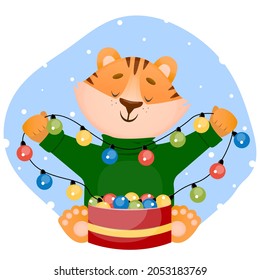 Funny little happy tiger cub holding a garland in his hands. Vector character illustration in flat style. Winter holidays concept.