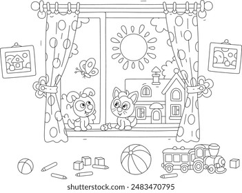 Funny little puppy and kitten sitting on a windowsill in a nursery room with toys and talking happily