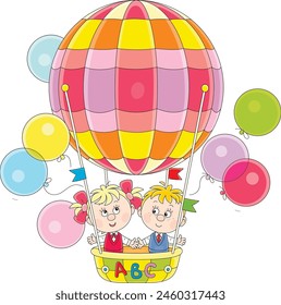 Funny little schoolboy and schoolgirl flying with a colorful air balloon, friendly smiling and waving in greeting, vector cartoon illustration on a white background