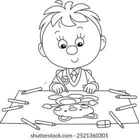 Funny little schoolboy sitting at his desk in class of primary school and drawing a funny smiling cat with pencils on a large sheet of paper, black and white vector illustration for a coloring book
