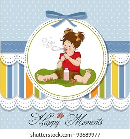 funny lovely little girl blowing soap bubbles