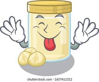 Funny macadamia nut butter mascot design with Tongue out