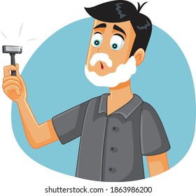 Funny Man Ready to Shave Holding a Razor. Handsome young guy grooming his facial hair
