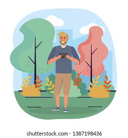 funny man with smartphone technology and trees