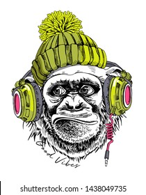 Funny Monkey in a hipster green knitted hat and in a headphones. Good vibes - lettering quote. Humor card, t-shirt composition, hand drawn style print. Vector illustration.