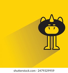 funny monster character with drop shadow on yellow background