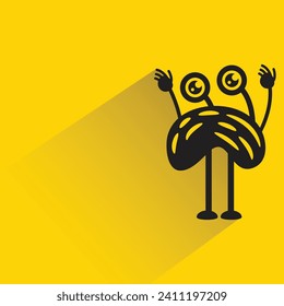 personaje monstruo gracioso con sombra sobre fondo amarillo