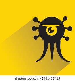 personaje monstruo divertido con sombra sobre fondo amarillo
