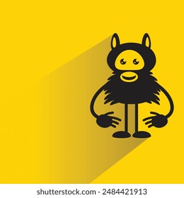 funny monster character with shadow on yellow background