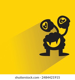 personaje monstruo divertido con sombra sobre fondo amarillo