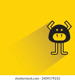 funny monster icon with shadow on yellow background