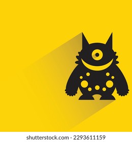 funny monster with shadow on yellow background