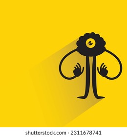 funny monster with shadow on yellow background