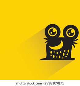funny monster with shadow on yellow background