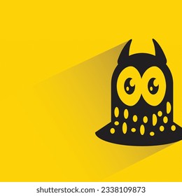 funny monster with shadow on yellow background