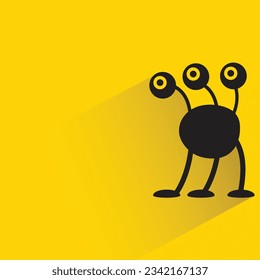 funny monster with shadow on yellow background