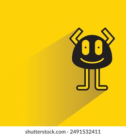 funny monster with shadow on yellow background