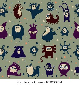 Funny monsters seamless pattern, on green background.
