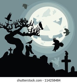 A funny moon over the cemetery in the dark Halloween night