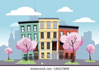 Funny multi-colored low city apartment buildings on the background of a big city. In front of the houses are blooming spring trees on green lawns. Flat cartoon vector illustration