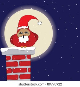 Funny owl dressed like Santa on a chimney