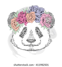 Funny panda in a flower wreath. Vector illustration.