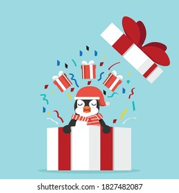 Funny penguin with gift box