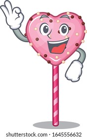 A funny picture of candy heart lollipop making an Okay gesture