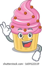 A funny picture of strawberry cupcake making an Okay gesture