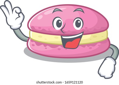 A funny picture of strawberry macarons making an Okay gesture