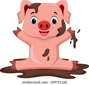 Funny pig playing in the mud