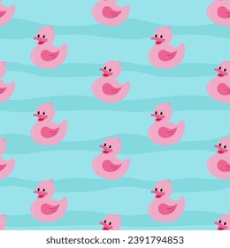 Funny pink rubber ducks in the water. Cute seamless pattern