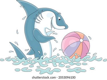Funny playful shark wallowing in waves of a tropical sea and playing a big colorful ball, vector cartoon illustration isolated on white background