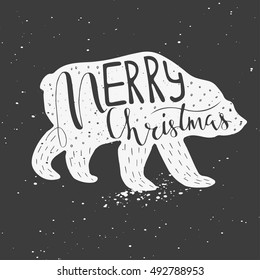 Funny polar bear with hand drawn lettering, quote Merry Christmas on snowy background. Cute  illustration for card, poster, t-shirt design, banner or home decor element. Vector typography.