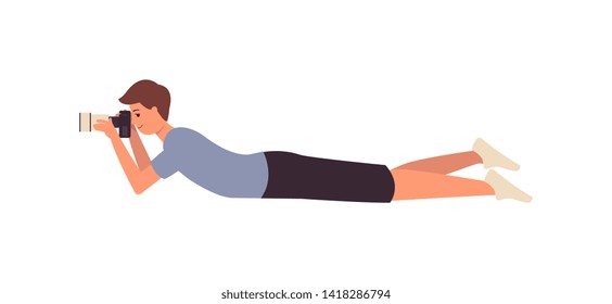 Funny professional photographer with camera taking photo in lying pose vector cartoon illustration isolated on white background. Cameraman or journalist character.