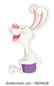 Funny rabbit on a chamber-pot