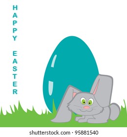 Funny rabbit on grass. Easter greeting card