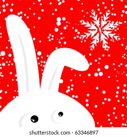 Funny rabbit on red christmas snowing background