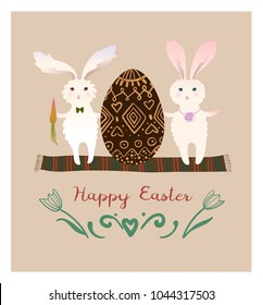 Funny rabbits with easter eggs.